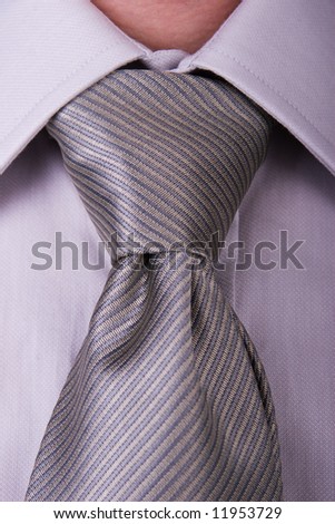 Businessman, white collar worker - closeup of a shirt and tie required in a business formalwear