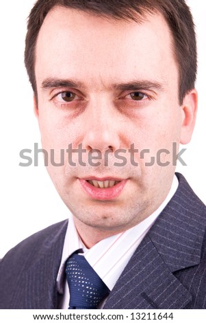 Waist up portrait of successful young businessman, wearing formal attire. Studio shot isolated on white background