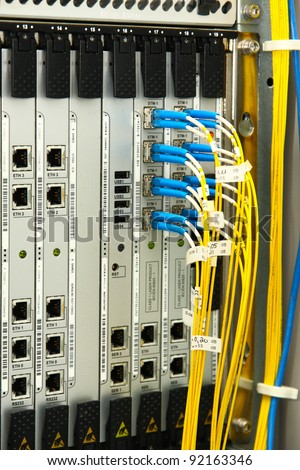 Fiber Optics with SC/LC connectors. Internet Service Provider equipment. Focus on fiber optic cables. Data Network Hardware Concept.