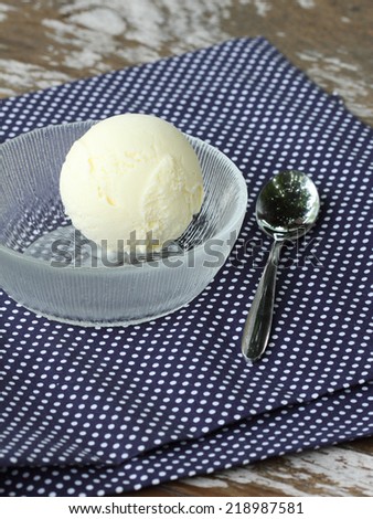 corn milk ice cream scoop on polka dot background