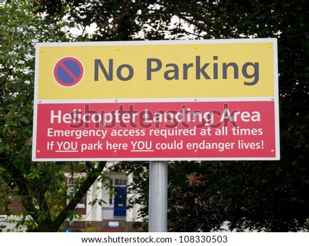 Warning sign depicting a helicopter landing zone in a hospital