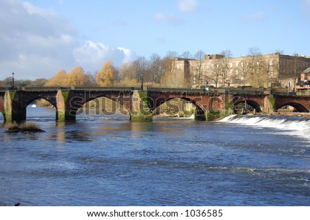 Sandstone arched bridge which crosses the River
