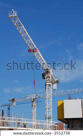Construction cranes on a new development in Liverpool UK