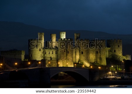 Conway castle in North Wales lit up just as it is about to go dark