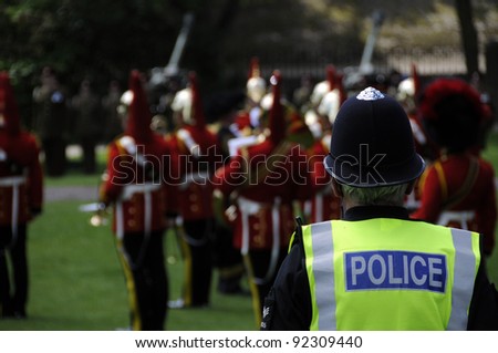 YORK, UK - JUNE 02. Policeman watches whilst Military brass band celebrate the Queens coronation. On June 02, 2011 in York