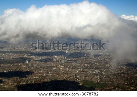 aerial view of  clouds from flight and london beneath