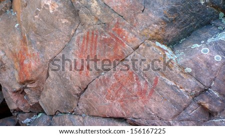 Cliff rock painting of Ojibwe People in Bon Echo Park in Ontario, Canada