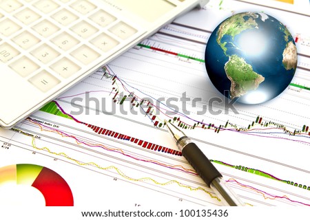 Pen and business graph with earth  (Elements of this image furnished by NASA)