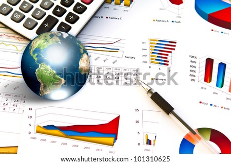 Pen and business graph with earth (Elements of this image furnished by NASA)