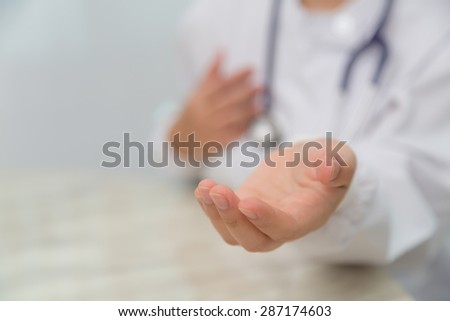 Doctor holding something in his hand