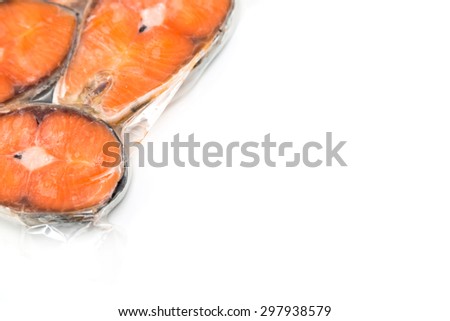 Frozen salmon fillets in a vacuum package