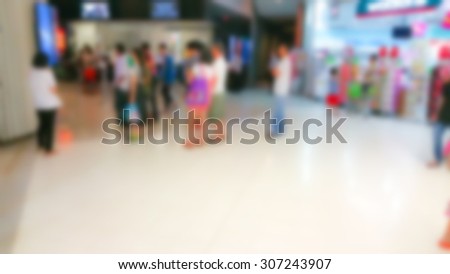 Abstract blur People Buying Tickets At The Cinema Premiere Movies