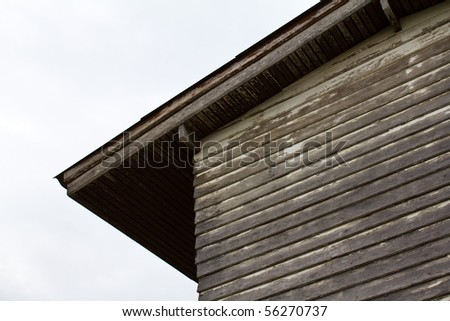 Side of old wood  house showing