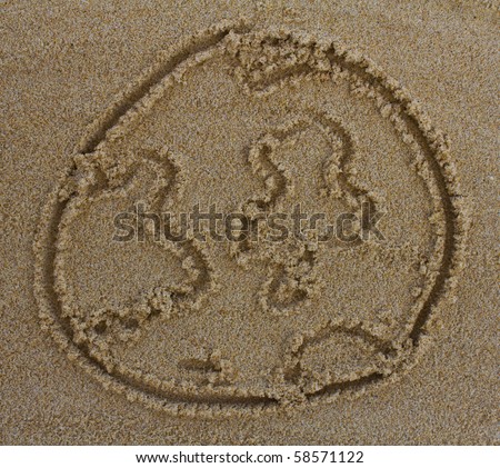 Global - World - Earth drawing in the sand on the beach