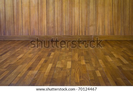 Dimensional Room with a Wood Paneled Wall and Wood Floor.