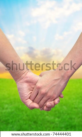 Hand touches hand