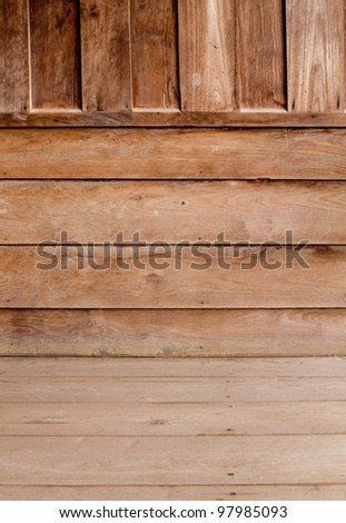 Dimensional Room with a Wood Paneled Wall and Wood Floor.