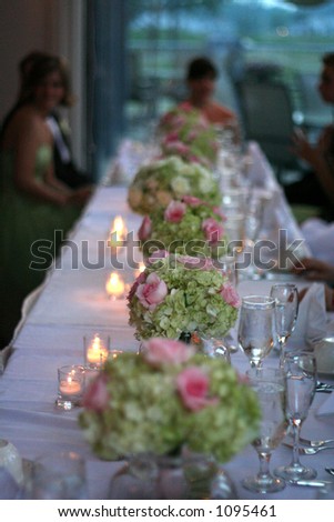 table with flowers at wedding reception