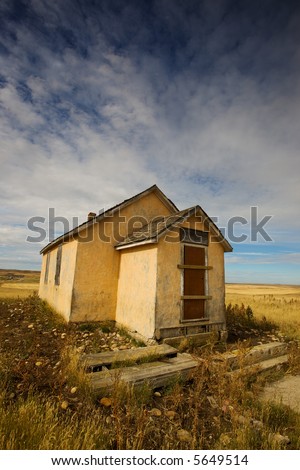 Old abandoned school house on the prairie
