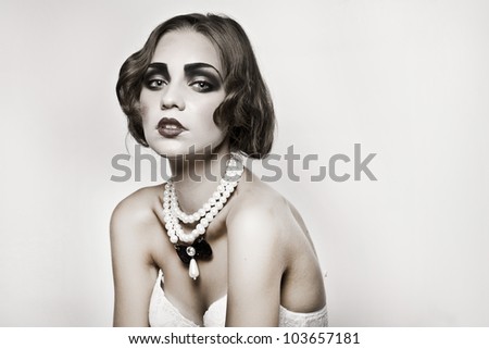 beautiful model with jewelry posing fashion in studio