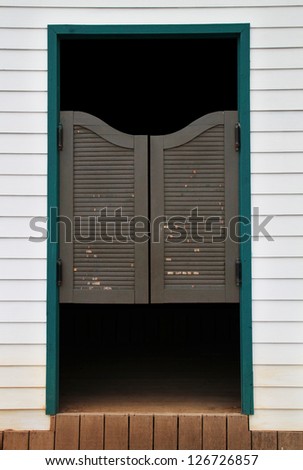 Authentic saloon doors of old western building.