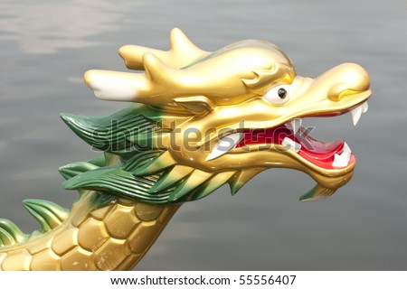 Dragon Boat Head Rest With Water Background