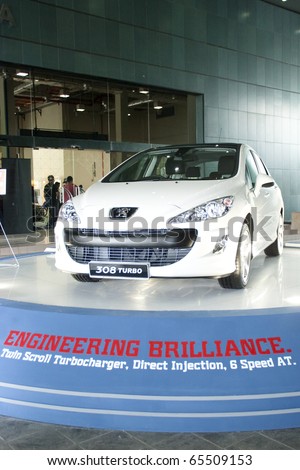 KUALA LUMPUR - NOVEMBER 20 : Peugeot 308 Turbo with turbocharging technology are shown on display at COTY2U Motor Carnival on November 20, 2010 in Kuala Lumpur, Malaysia.
