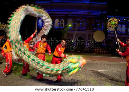KUALA LUMPUR, MALAYSIA-MAY 20:Malaysian Chinese performing a dragon dance at the rehearsal of Colours of 1 Malaysia May 20 2011 in Kuala Lumpur Malaysia. 24.6million tourist visited Malaysia in 2010.