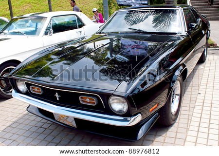KUALA LUMPUR - NOV 13: A Black Ford Mustang on display at the Asia Klasika Malaysia International Vintage & Classic Car Concours during COTY2U Autoshow on November 13, 2011 in Kuala Lumpur, Malaysia.