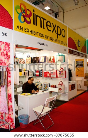 KUALA LUMPUR-NOV 23: Trade exhibitor from India showcasing their product and services at the International Trade Malaysia (INTRADE 2011) Exhibition on November 23, 2011 in Kuala Lumpur, Malaysia.