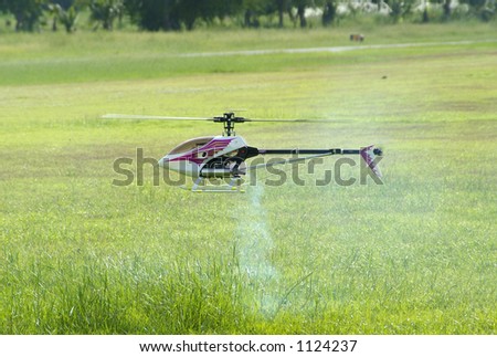 Radio controlled model helicopter hovering