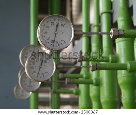 Industrial temperature meters for liquids. Shallow depth of field.