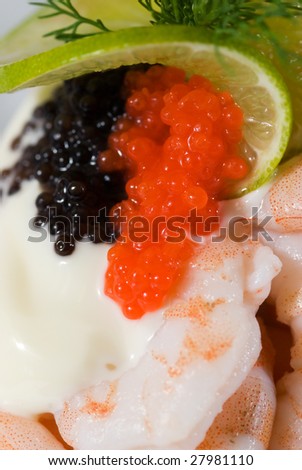 Detail of seafood sandwich with shrimps, roe of capelin, mayonnaise, lime and dill.