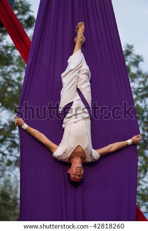 BANGKOK, THAILAND - DECEMBER 13: Member of the Dutch acrobatic dance group Bencha Theater during a performance at the International Street Show on December 10 to 13, 2009 in Bangkok, Thailand.