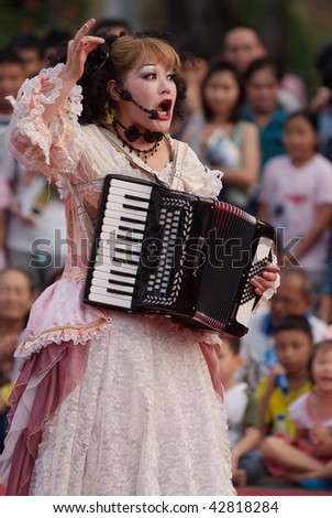 BANGKOK, THAILAND - DECEMBER 13: Japanese musical clown Migiwa, Clown of the Opera, during a performance at the International Street Show on December 10 to 13, 2009 in Bangkok, Thailand.