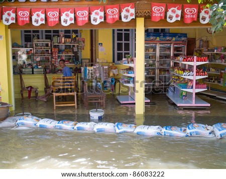 AYUTTAYA, THAILAND - OCTOBER 5: Local shop flooded during the monsoon season in Ayuttaya, Thailand on October 5, 2011.