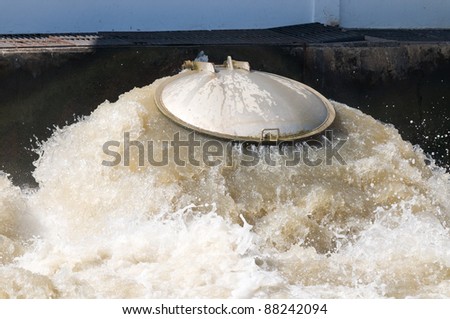 Outlet valve at water pumping station that pumps flood water from the canals out into the sea in Samut Prakan province in Thailand.