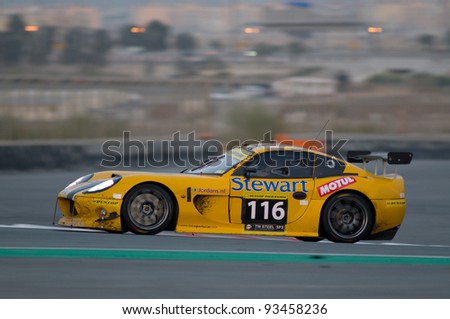 stock-photo-dubai-january-car-a-ginetta-g-trophy-competes-during-the-morning-hours-of-the-93458236.jpg