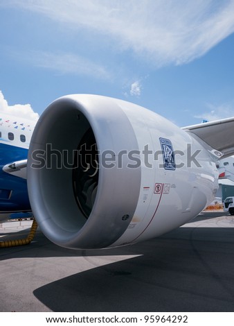 SINGAPORE - FEBRUARY 12: One of the two Rolls Royce Trent 1000 engines of the Boeing 787 Dreamliner at Singapore Airshow in Singapore on February 12, 2012.