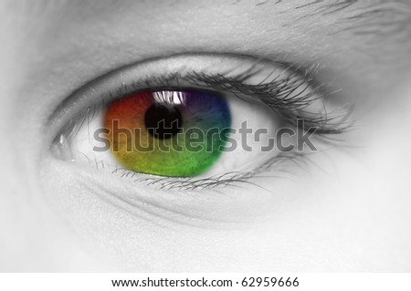 Macro of child\'s eye with rainbow colors