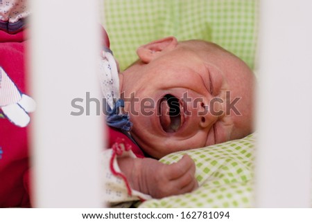 Newborn baby crying.