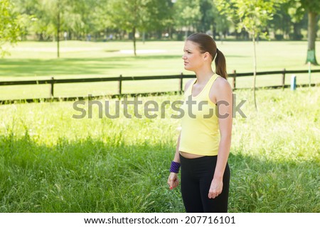 Fitness woman ready for exercising in nature.