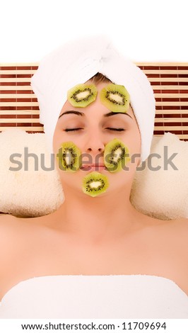 Beautiful girl wearing fruit facial mask.