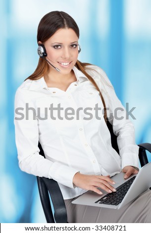 Friendly business customer service woman with laptop.
