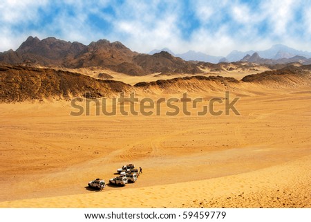 Landscape of desert with jeep ready for safari.