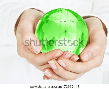 Human hands care about planet.