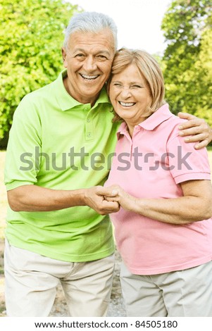 Portrait of happy old people looking at camera.