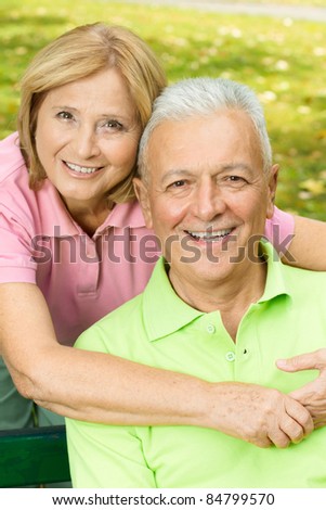 Closeup portrait of happy old people outdoors.