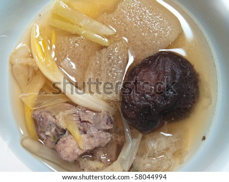 Chinese style soup with day lily, two type mushroom and spare rib