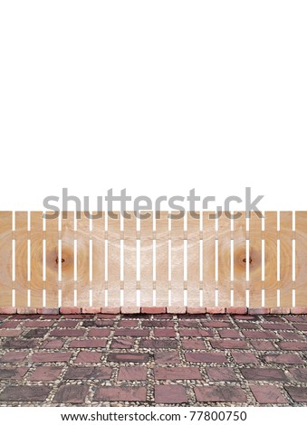 Wooden fence with stone square paving by granite and cobblestone isolate on white